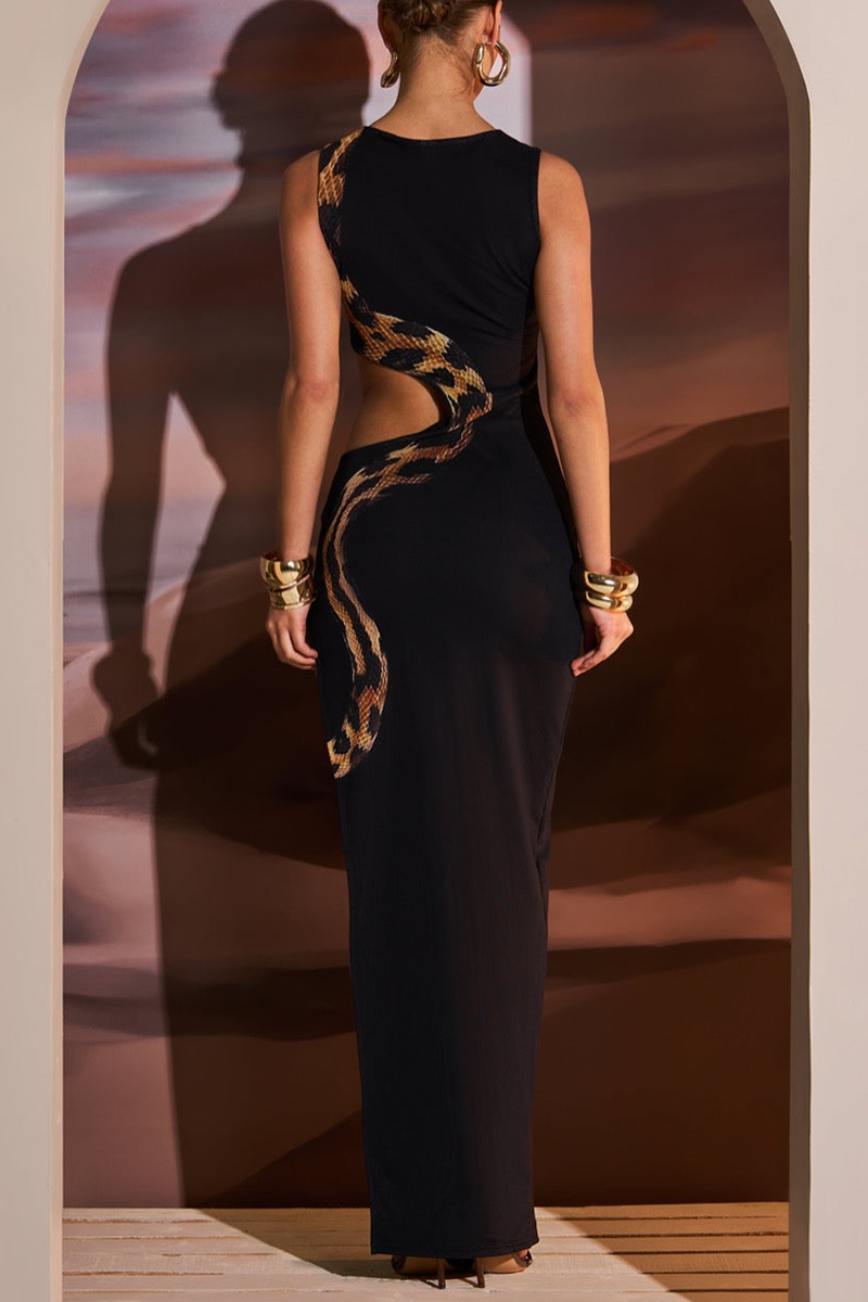 Back view of a woman in a black sleeveless maxi dress with a high neckline and cut-out detailing along the sides, showcasing the snake print.