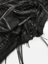 Close-up of the zipper and construction details of a feather-trimmed dress.