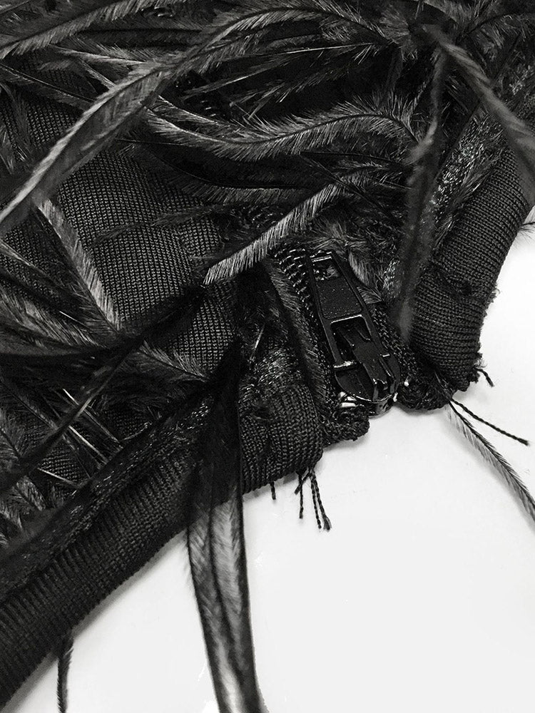 Close-up of the zipper and construction details of a feather-trimmed dress.