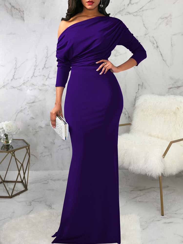 woman wearing a purple one-shoulder draped long sleeve mermaid formal gown