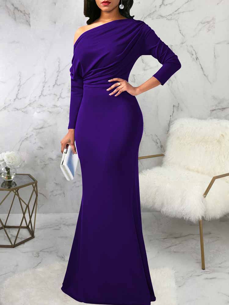 front view of a woman wearing a purple one-shoulder draped long sleeve mermaid formal gown