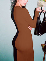 Side view of a woman in a brown and black color-block ribbed knit midi dress