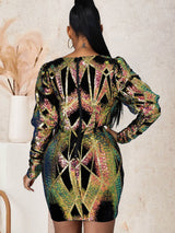 Rear view of a woman wearing a sequined mini dress.