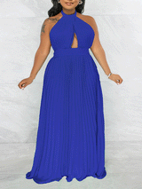 Woman wearing a royal blue halter neck maxi dress with a keyhole cutout and pleated skirt, front view.