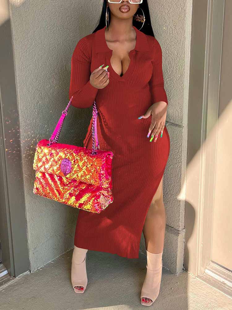 Woman wearing a red ribbed knit midi dress with long sleeves and a v-neck collar, accessorized with a pink sequined handbag and tan heeled boots.