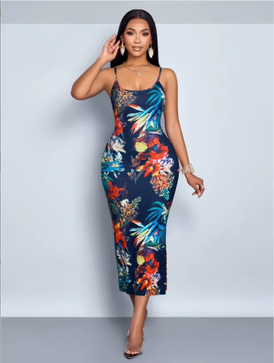 Woman wearing a navy blue floral print bodycon midi dress with spaghetti straps and a side slit.