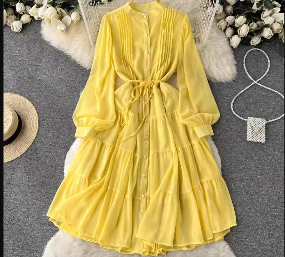 Yellow chiffon tiered midi dress with puffed sleeves and self-tie belt