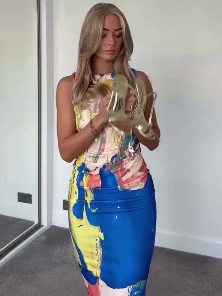 woman wearing abstract print midi dress