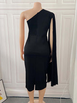 Back view of a black one-shoulder dress with a pleated sleeve on a mannequin