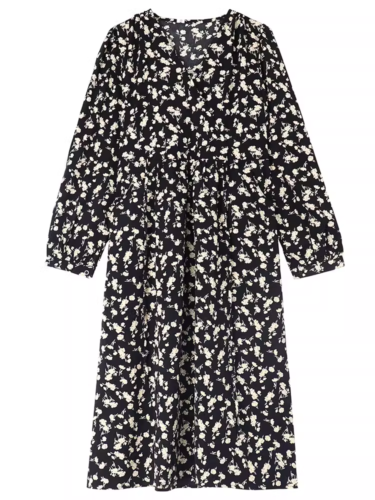 Close-up of the V-neckline on the floral print dress