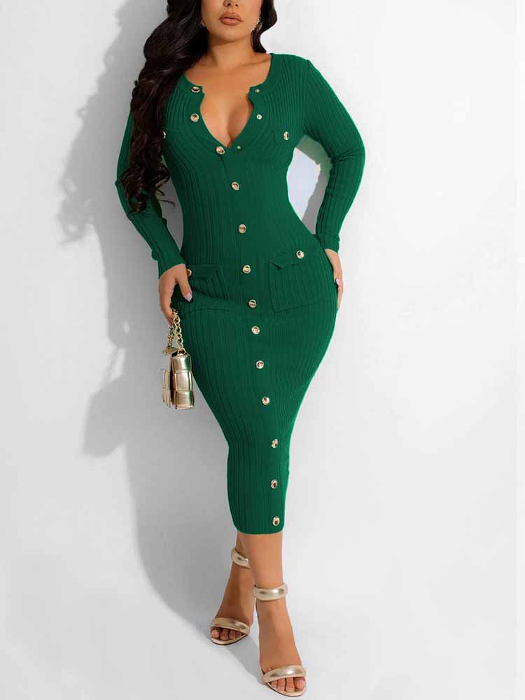 Full-length view of a woman in an emerald green ribbed knit midi dress with gold buttons and pockets.