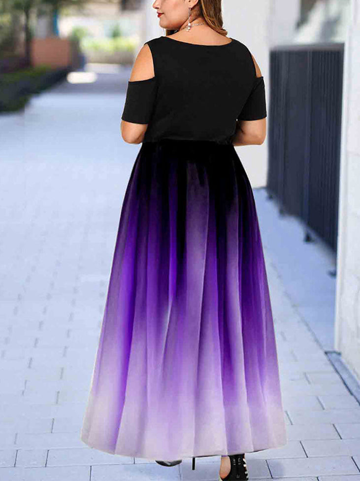 back view of a woman wearing a black and purple ombre maxi dress with cold shoulder sleeves