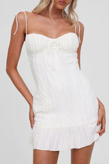 Textured mini dress with tie straps and ruffled hem - View 8 | Lwiis