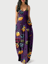 Woman wearing a purple maxi dress with a Halloween print featuring cartoon pumpkins and monsters.