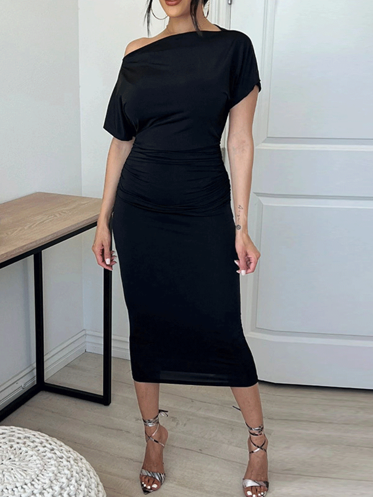 woman wearing a black one-shoulder ruched midi dress