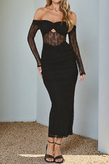 Woman wearing a black off-the-shoulder long-sleeved ruched lace midi dress with a keyhole detail on the bust.