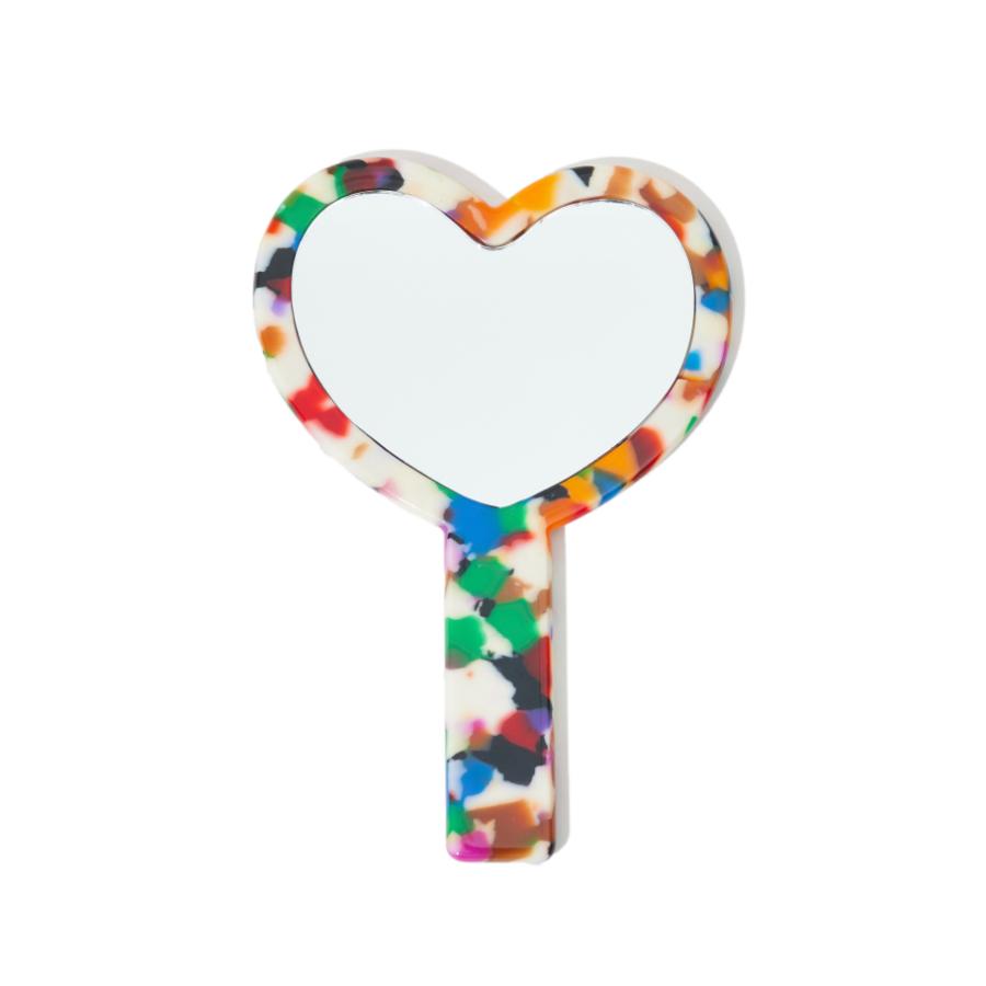 front view of a heart-shaped hand mirror with a multicolored confetti acetate frame