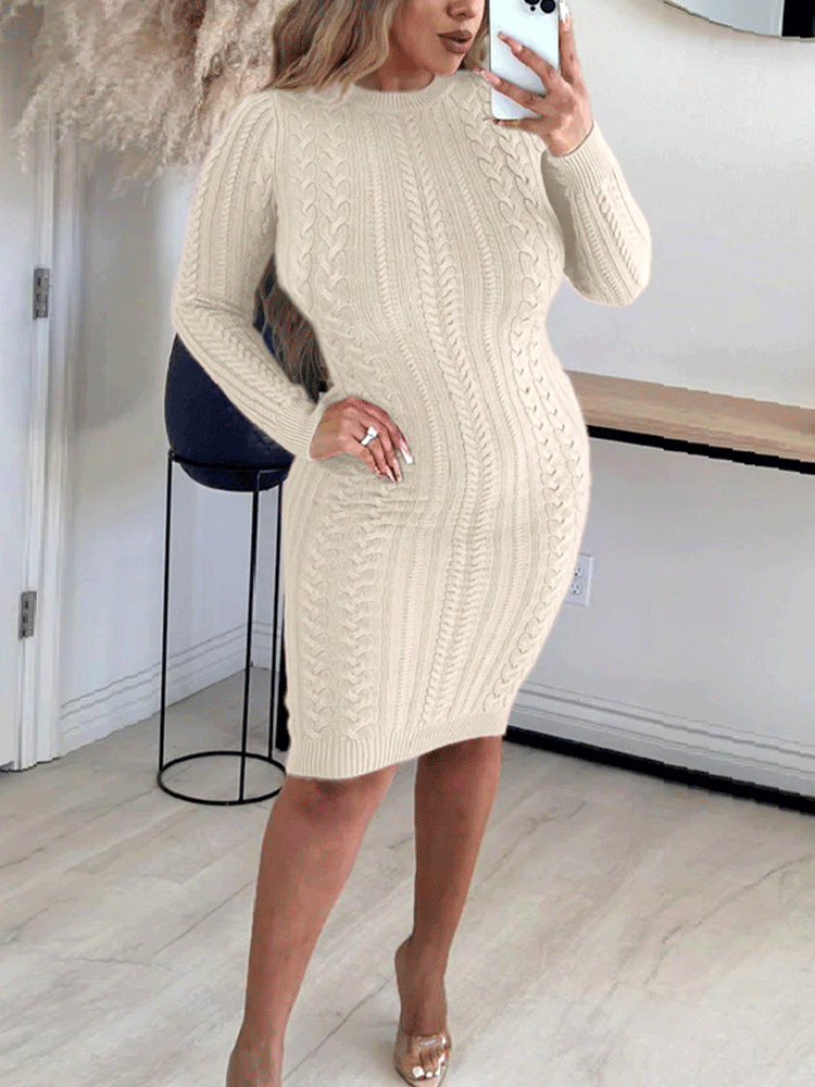 Woman wearing a cream-colored cable knit dress from the front