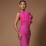 Close-up of the hot pink feather detail on the strapless bodycon dress