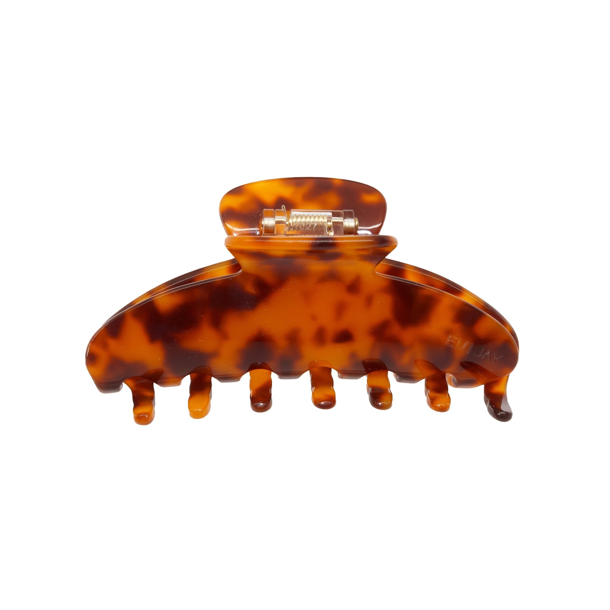 A tortoiseshell claw hair clip with a metal spring hinge.
