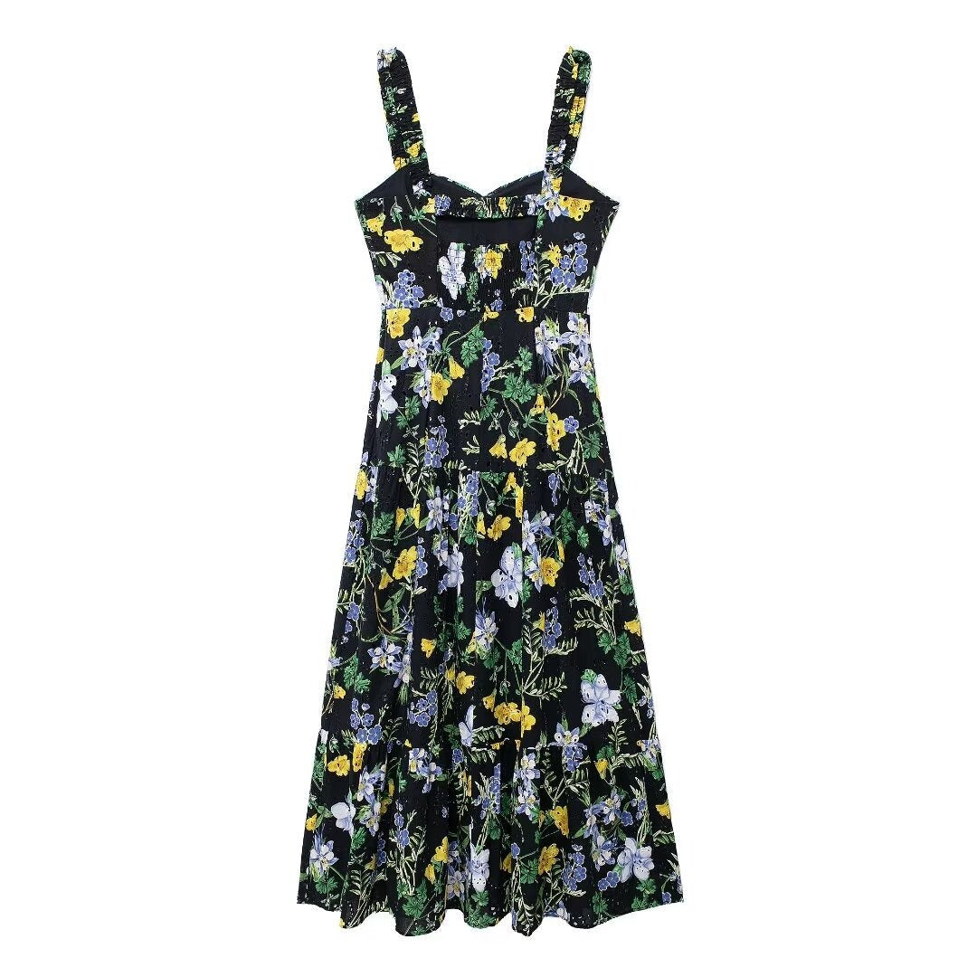 Back view of a black floral print midi dress