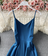 close-up of blue satin spaghetti strap v-neck bodice