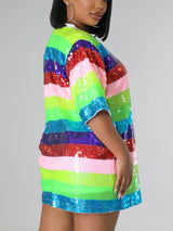 Side view of the sequined t-shirt dress.