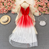 Red and white gradient tulle dress with spaghetti straps, a straw hat, and a beaded clutch