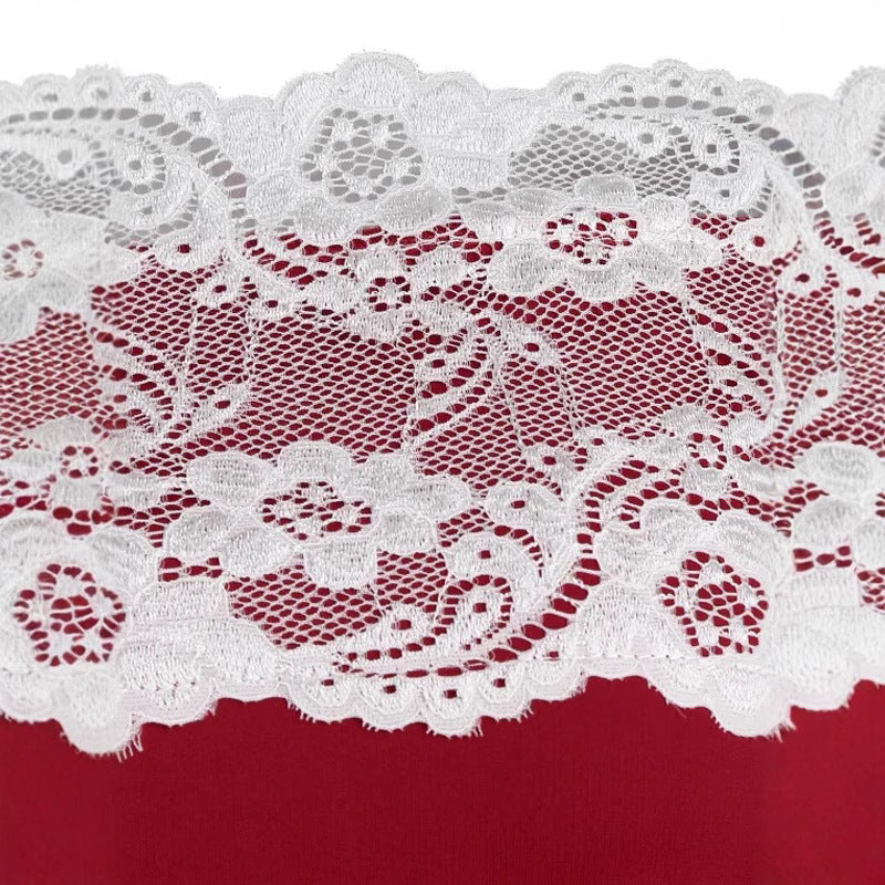 close-up of white lace trim on a red dress