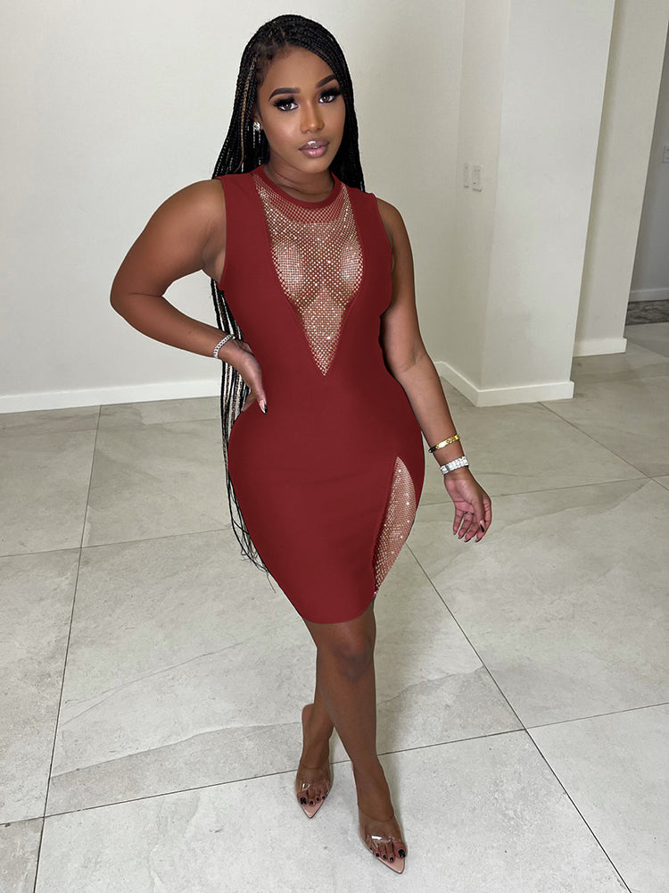 Woman in a deep red sleeveless bodycon mini dress, showcasing the embellished neckline and side slit.