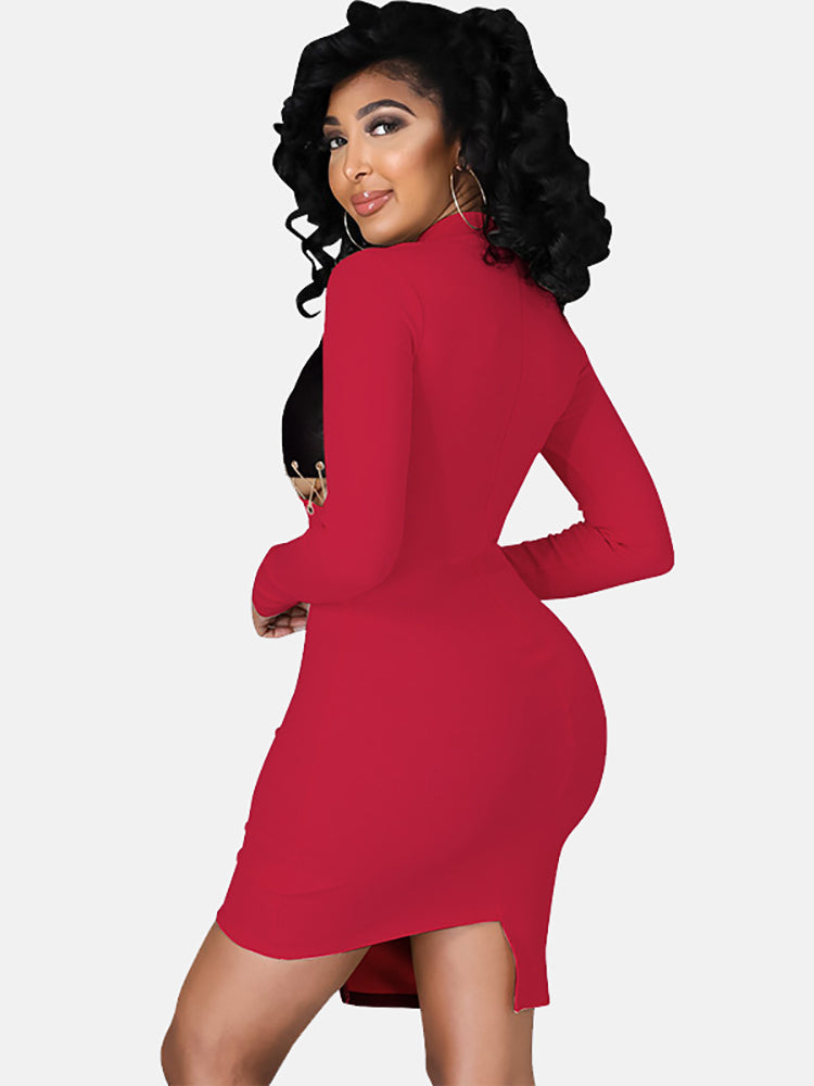 Back view of a woman in a red and black faux leather color-blocked bodycon dress.