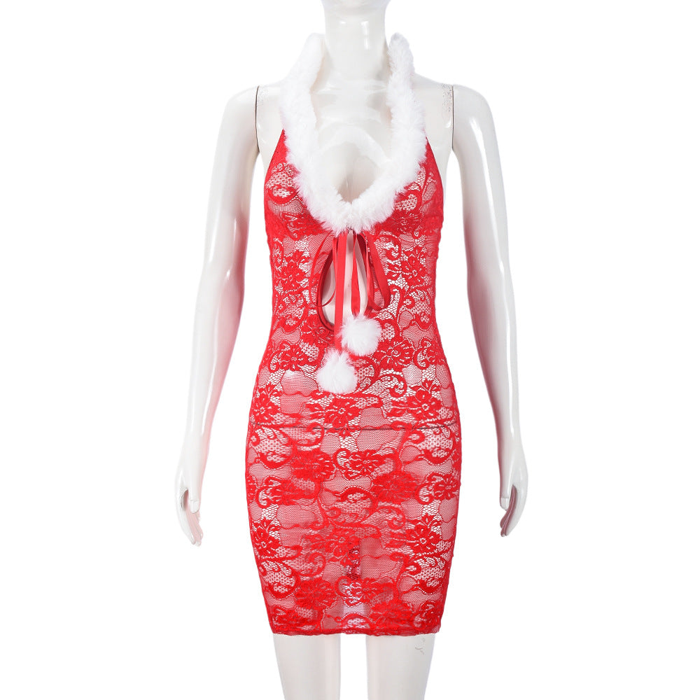 Red lace halter dress with faux fur trim and pom-poms displayed on a mannequin