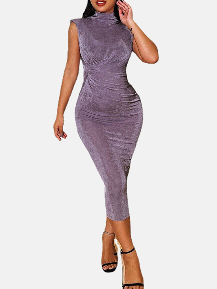 Woman wearing a purple velvet ruched bodycon dress with a high neck and sleeveless design.