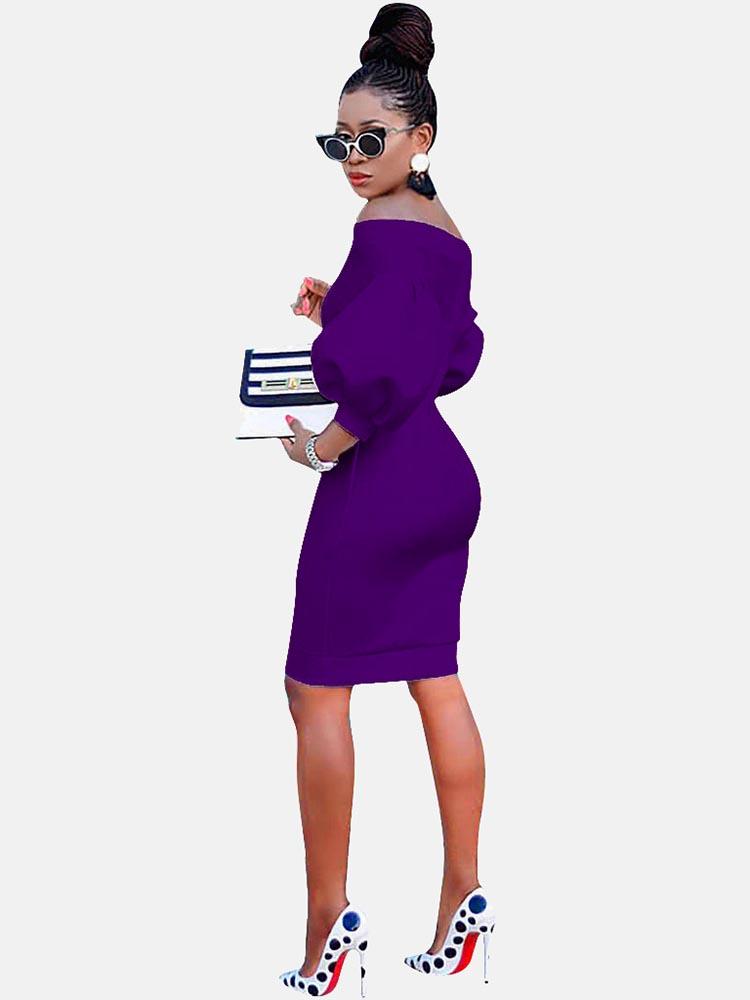 Rear view of a woman in a purple off-the-shoulder dress with puff sleeves