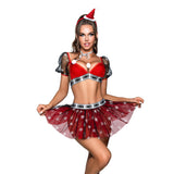 Woman wearing a red and black Christmas-themed costume with a Santa hat headband
