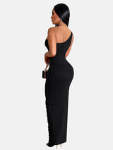 back view of a woman in a black one-shoulder column gown