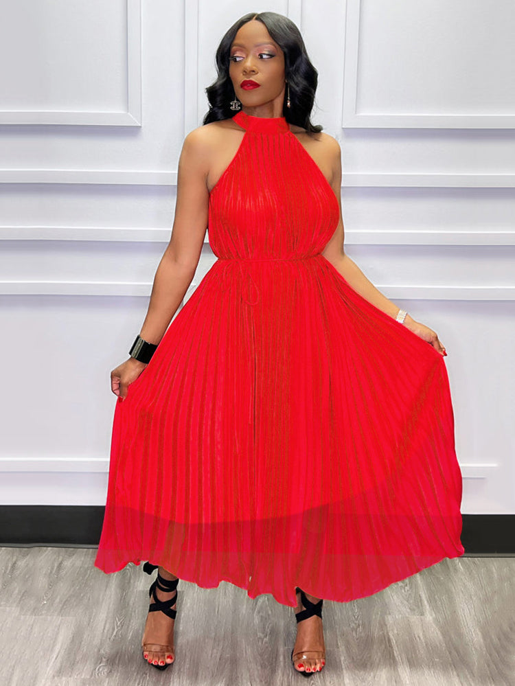 Woman wearing a red pleated A-line dress