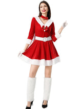 Full body shot of a woman in a Santa-inspired costume with white fur trim