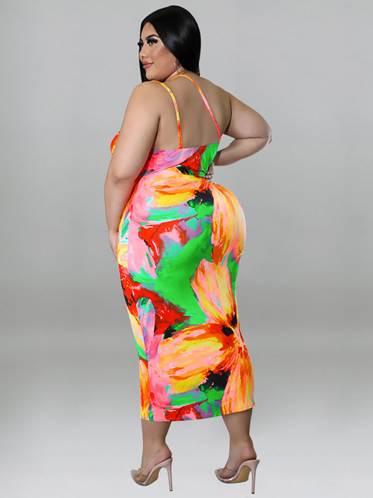 Plus-size woman wearing a colorful floral print halter neck bodycon midi dress with cut-out details and a tie waist, back view