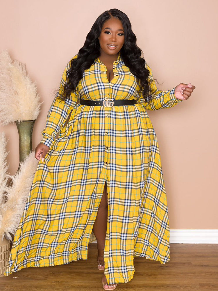 Woman wearing a yellow plaid maxi dress with a black belt