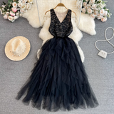 Black tiered tulle dress with lace bodice