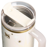 Stanley mug with handle and clear lid on a white background