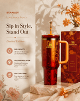 Stanley travel mug with Love Shack Fancy packaging on a decorative background