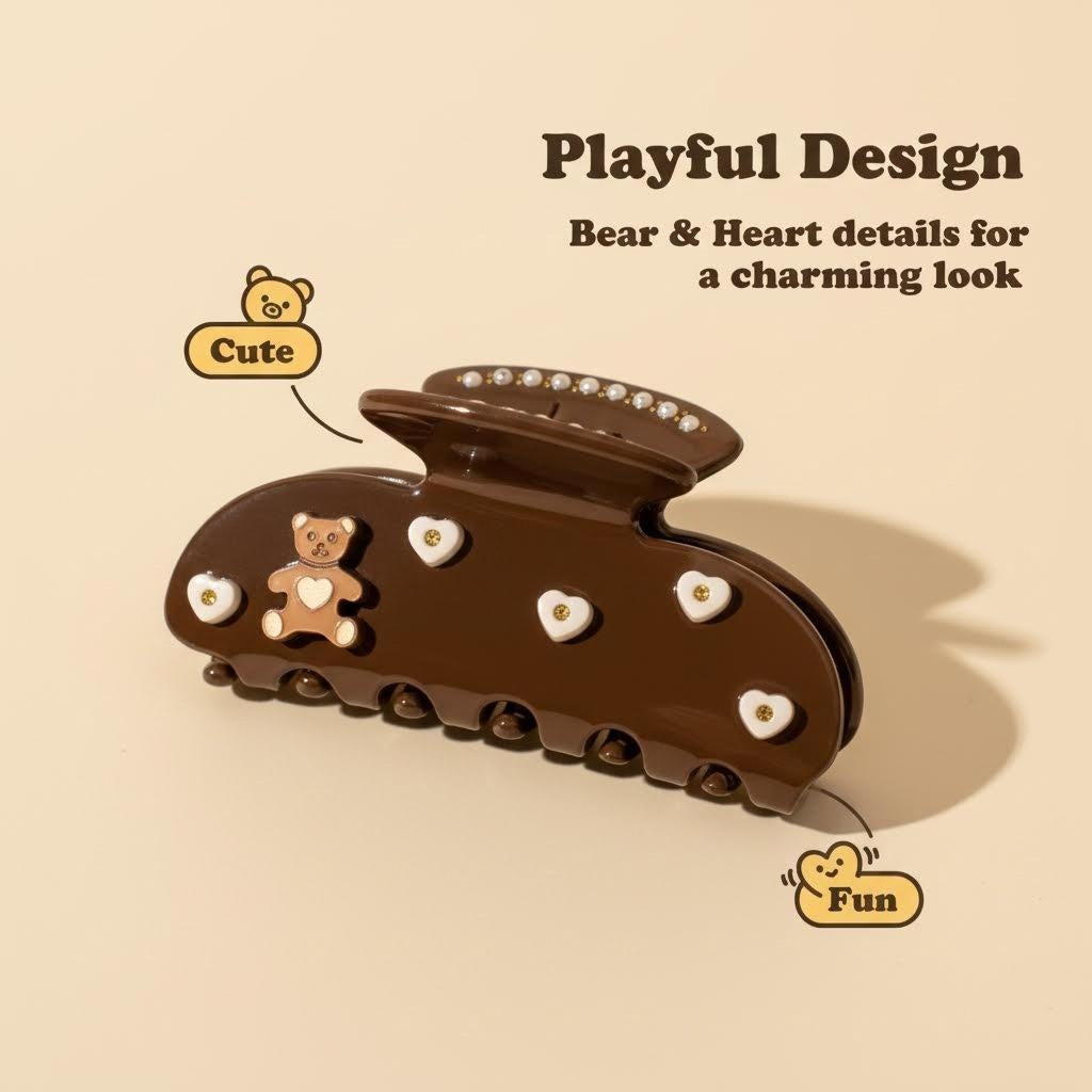 Product image of a brown teddy bear hair claw clip with heart details, with callouts for "Playful Design", "Cute", and "Fun"