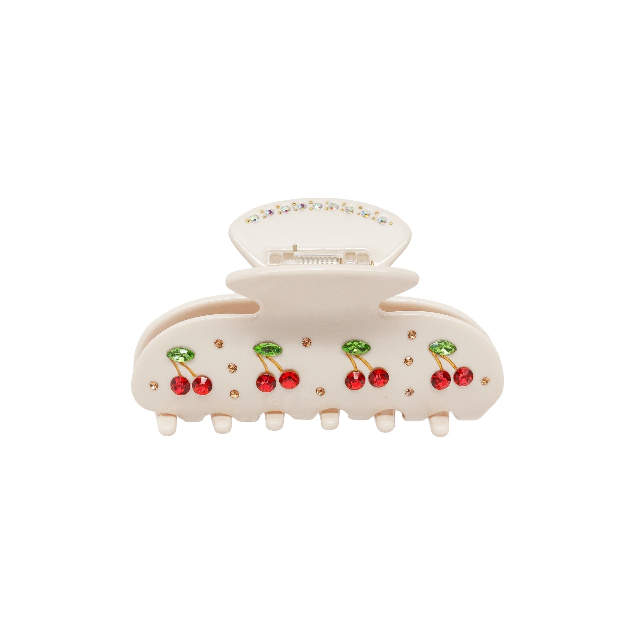 A cream-colored claw clip with cherry and rhinestone embellishments