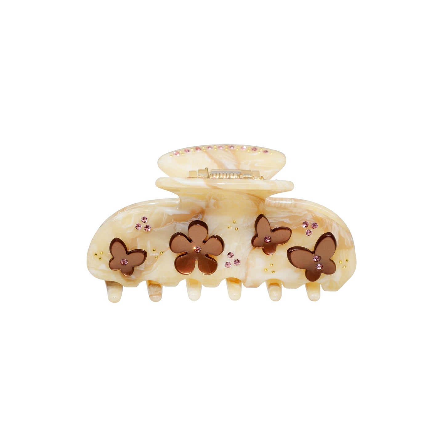 A cream-colored marbled claw clip with brown butterfly and flower embellishments, accented with pink rhinestones.
