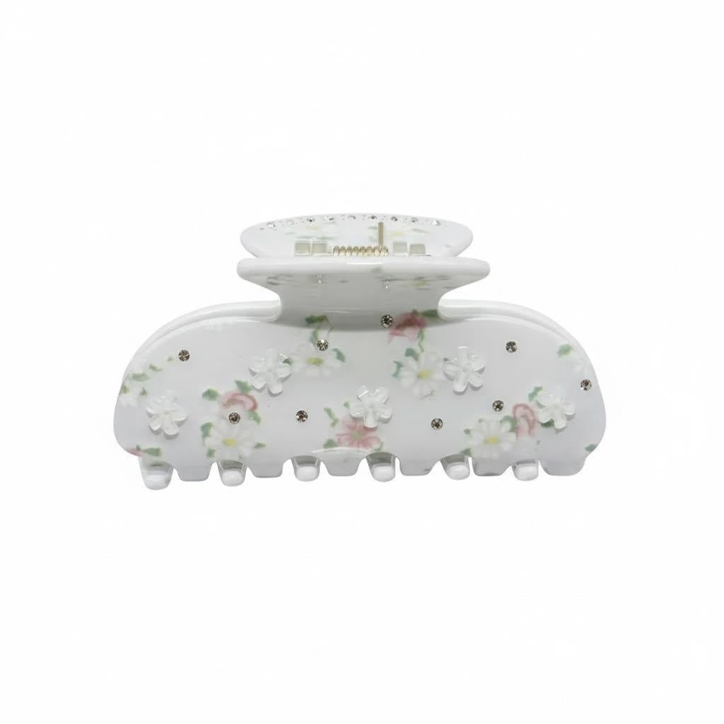 White floral claw hair clip with pink and white flowers and rhinestones