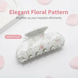 Close-up of the white floral claw hair clip with soft and fresh design