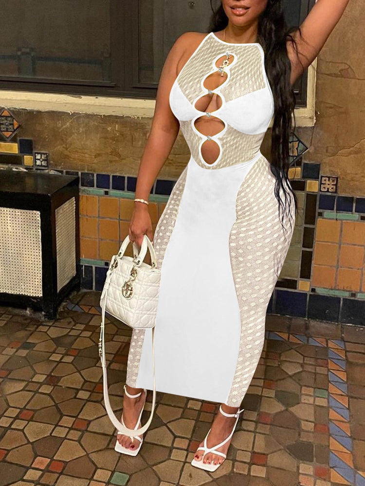 Woman wearing a white sleeveless bodycon dress with mesh side panels and cut-out neckline, holding a white handbag.