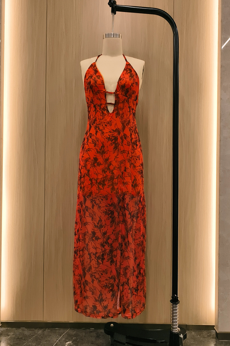 orange floral print maxi dress displayed on a mannequin